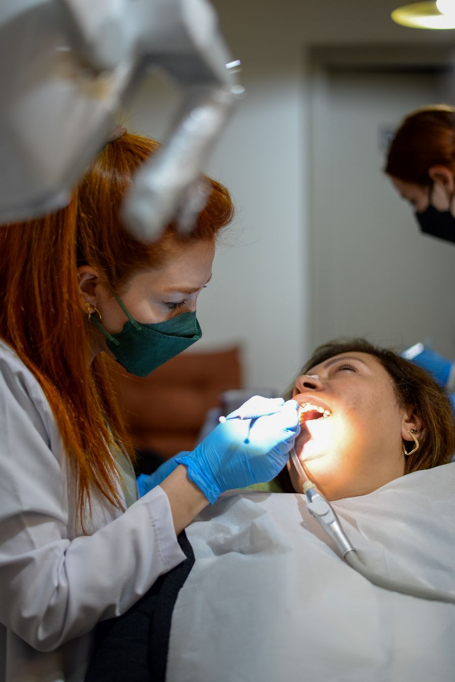 Dentist treating a patient at Arden Dental Studio