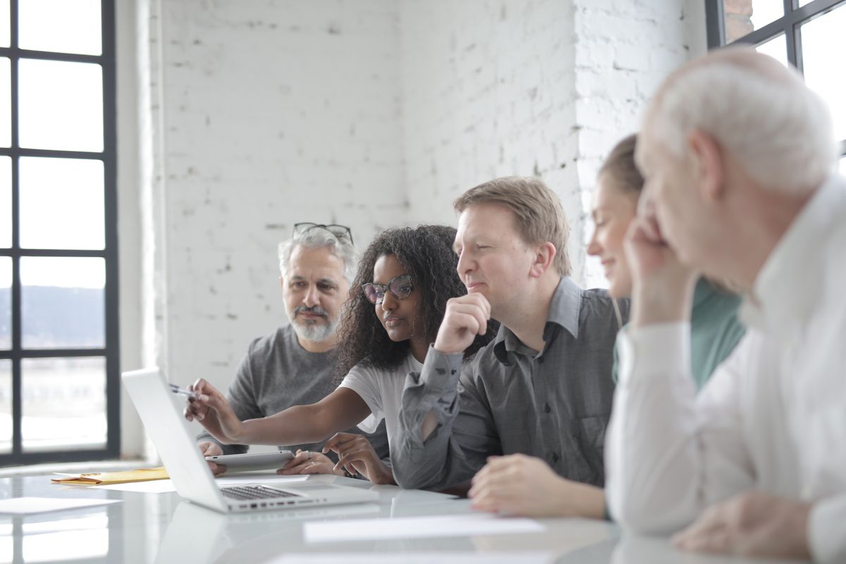 The Hookrate team reviewing creative reports together